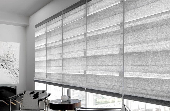 Gray shades covering large business window